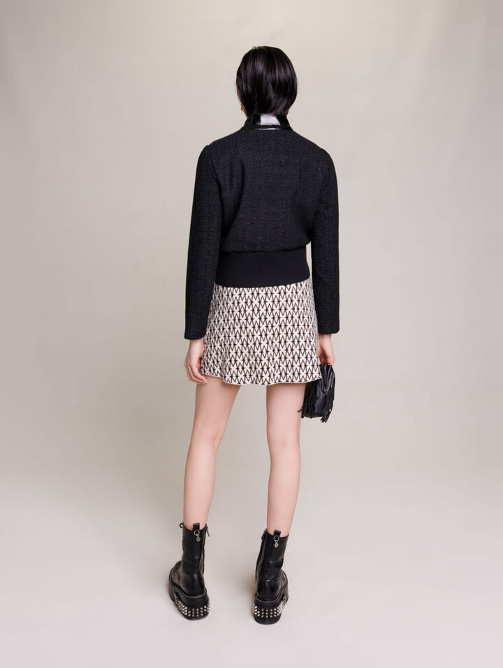 Giacca in tweed e vernice