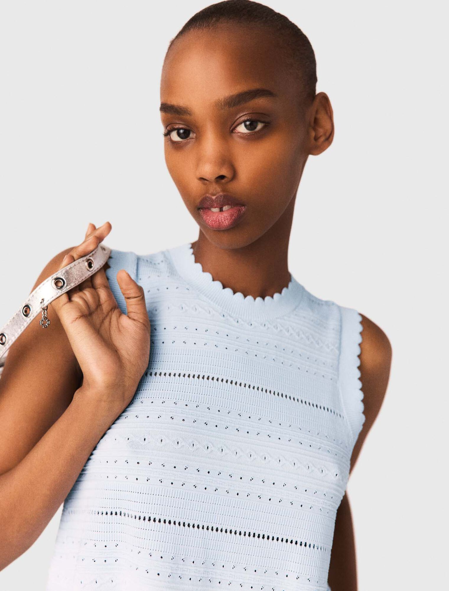 Top in maglia con volant