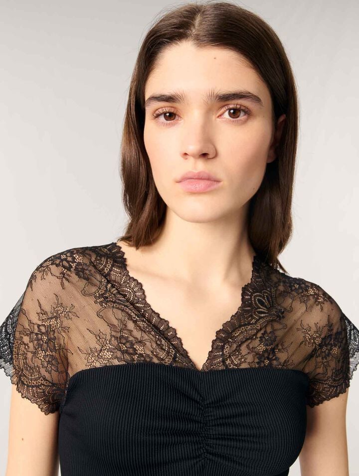 Top in jersey con applicazioni in pizzo