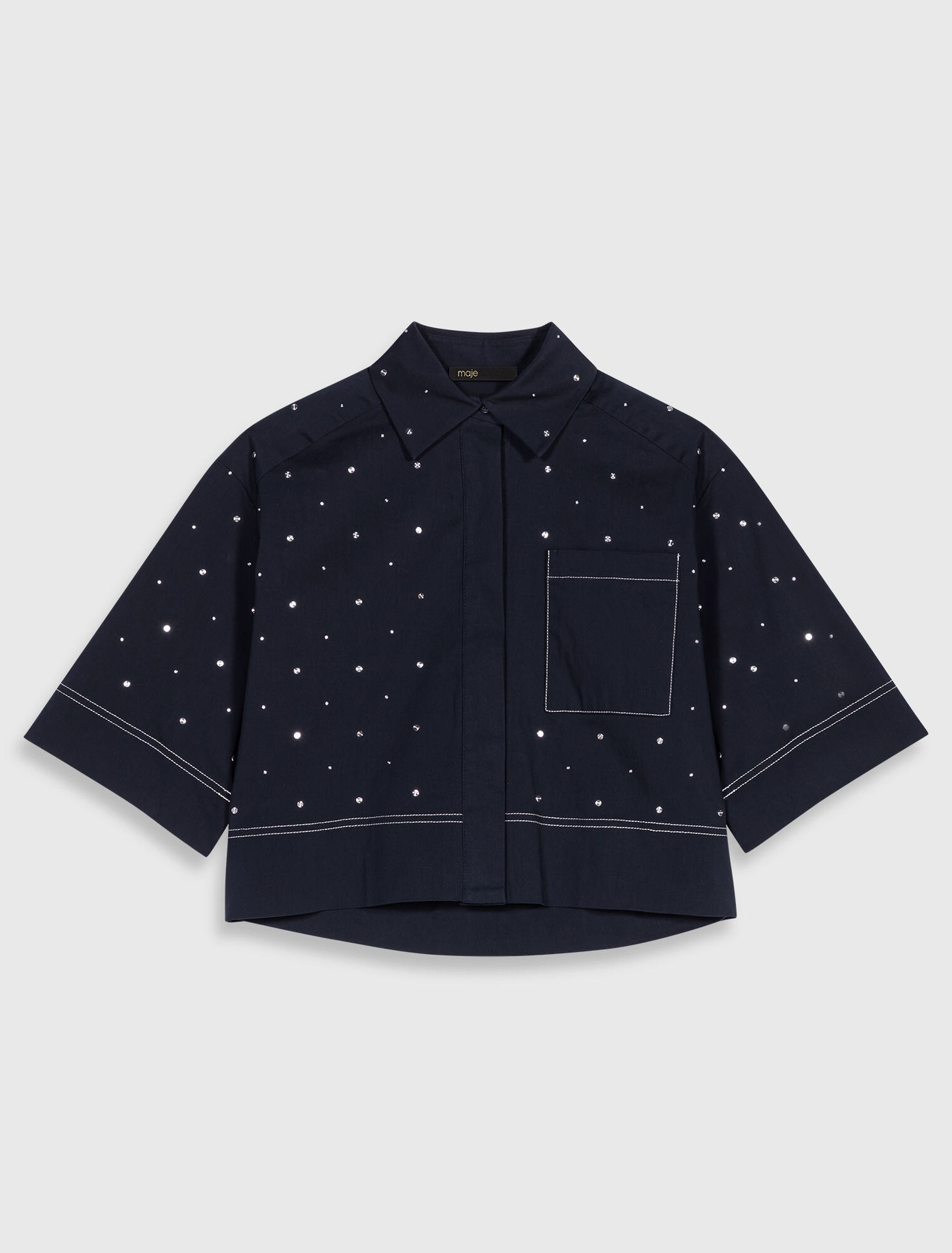 Camicia cropped con borchie
