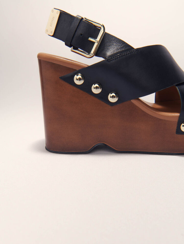 Sandali con zeppa in pelle
