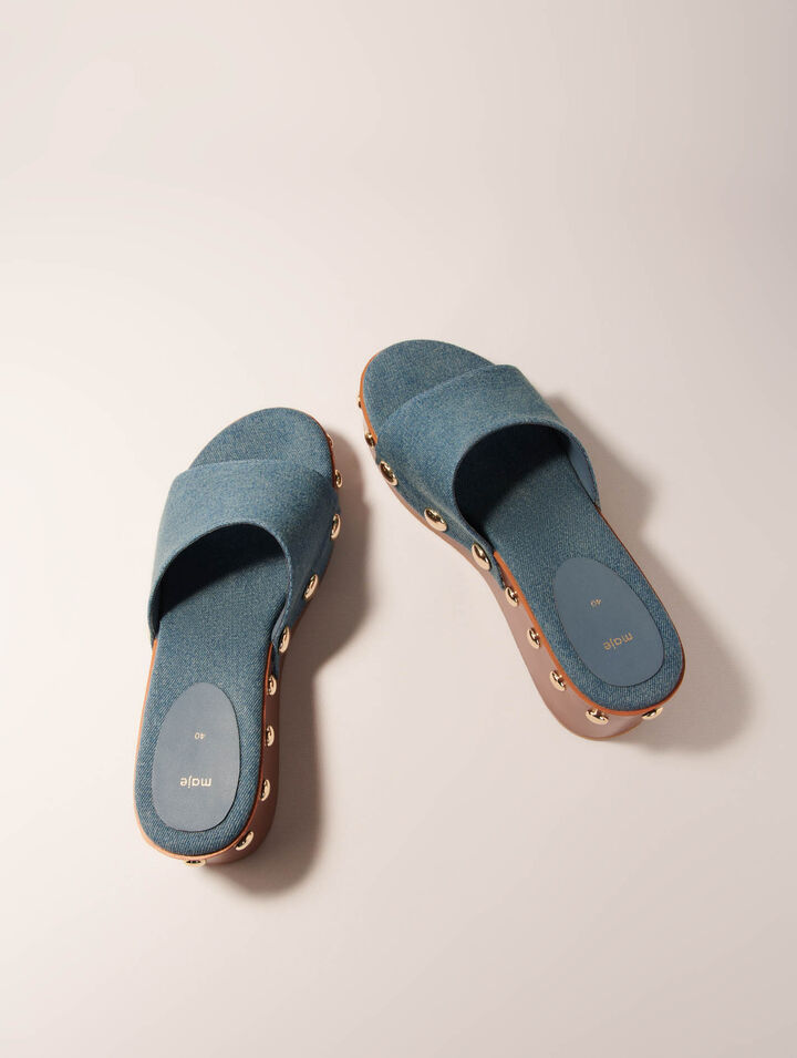 Mules con zeppa in denim e borchie