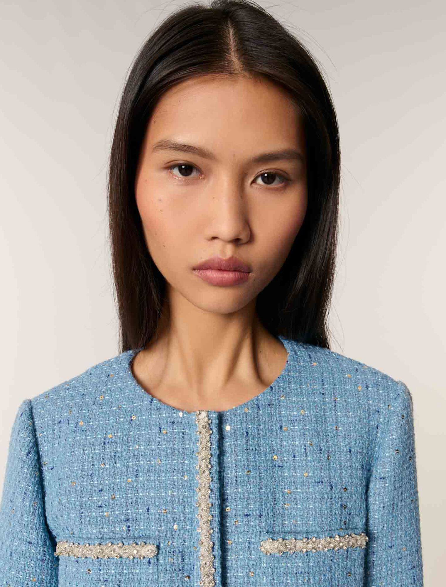 Giacca corta in tweed con lustrini