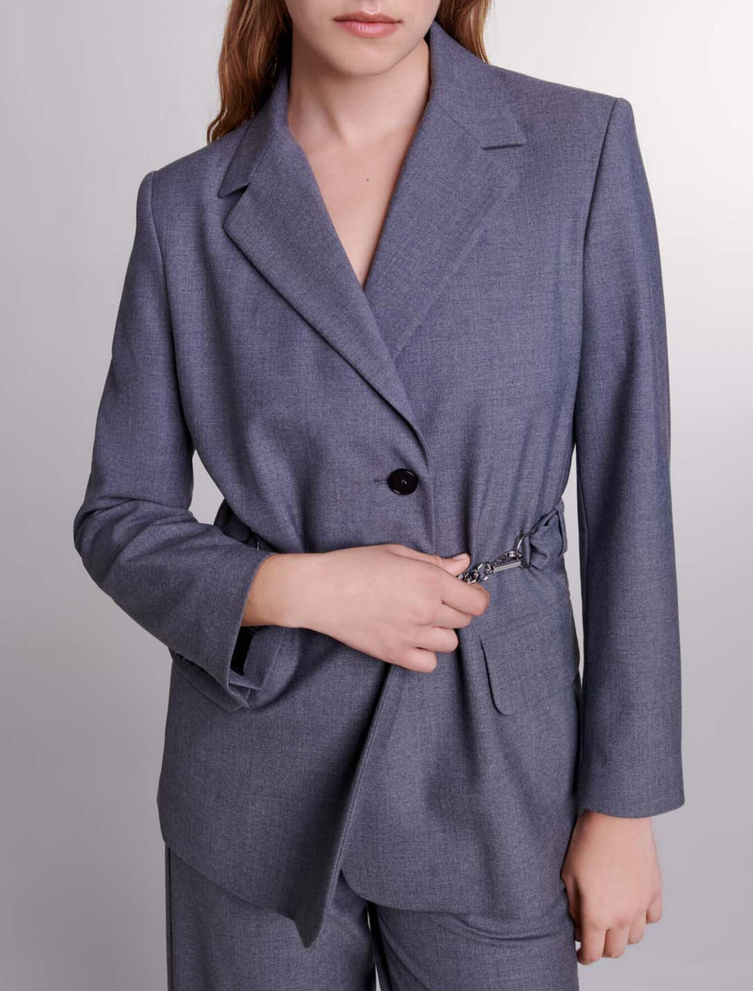 Giacca tailleur con catena in vita