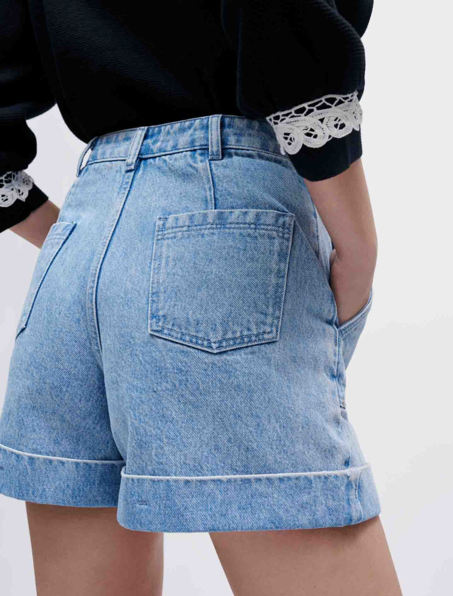 Pantaloncini in denim con borchie