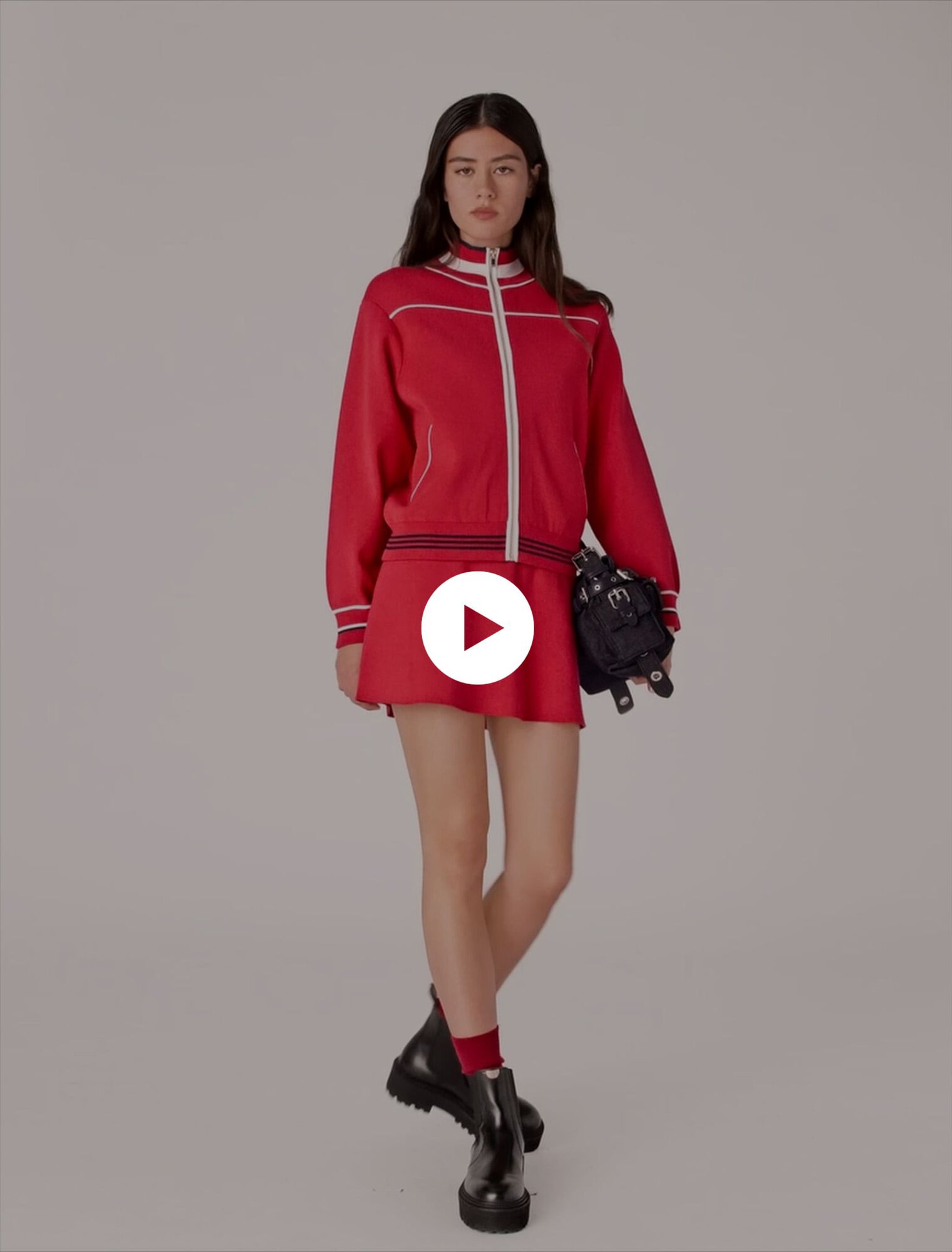 Cardigan con zip e vita elastica