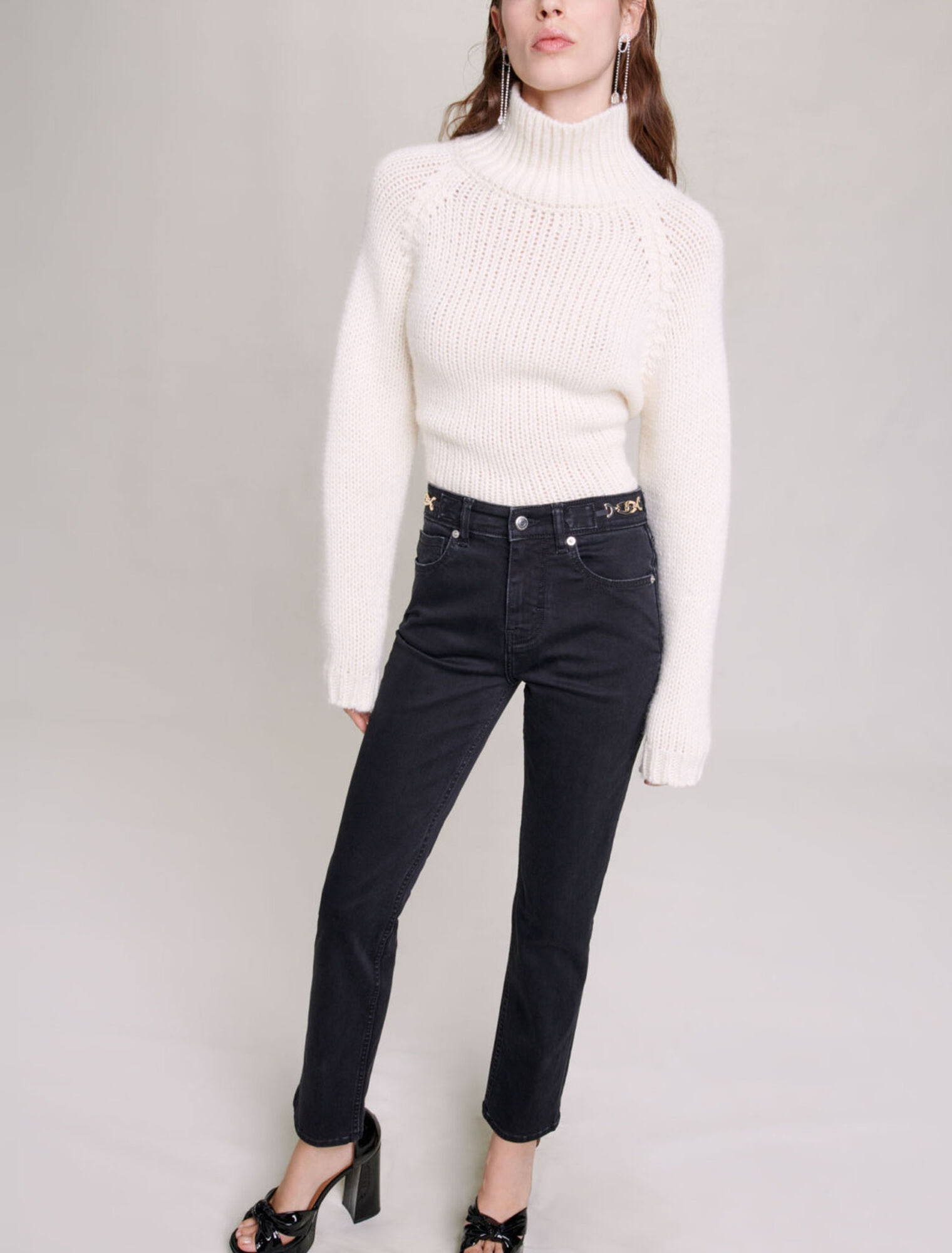 Jeans con catene e frange