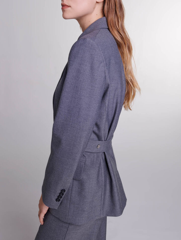 Giacca tailleur con catena in vita