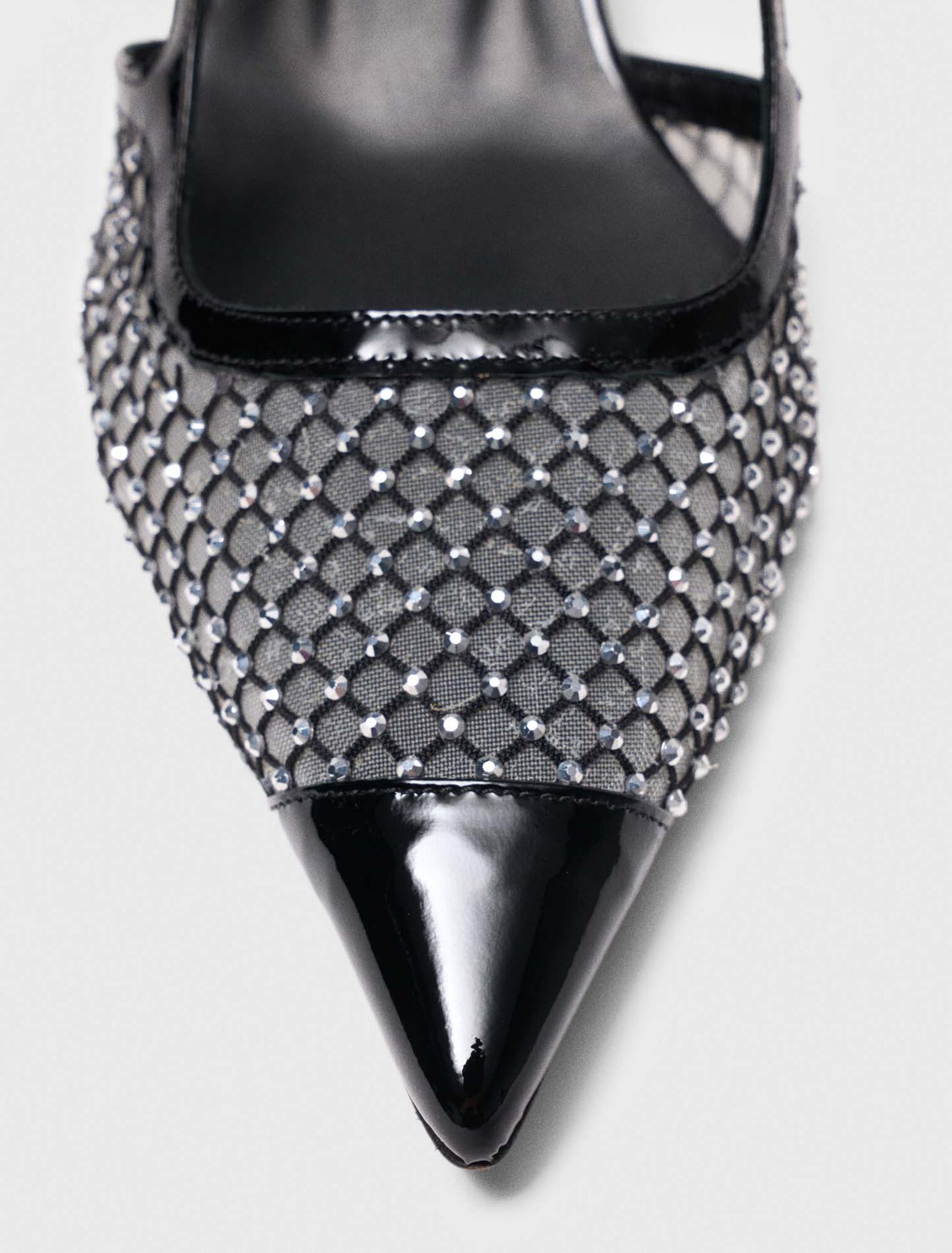 Décolleté in mesh con strass