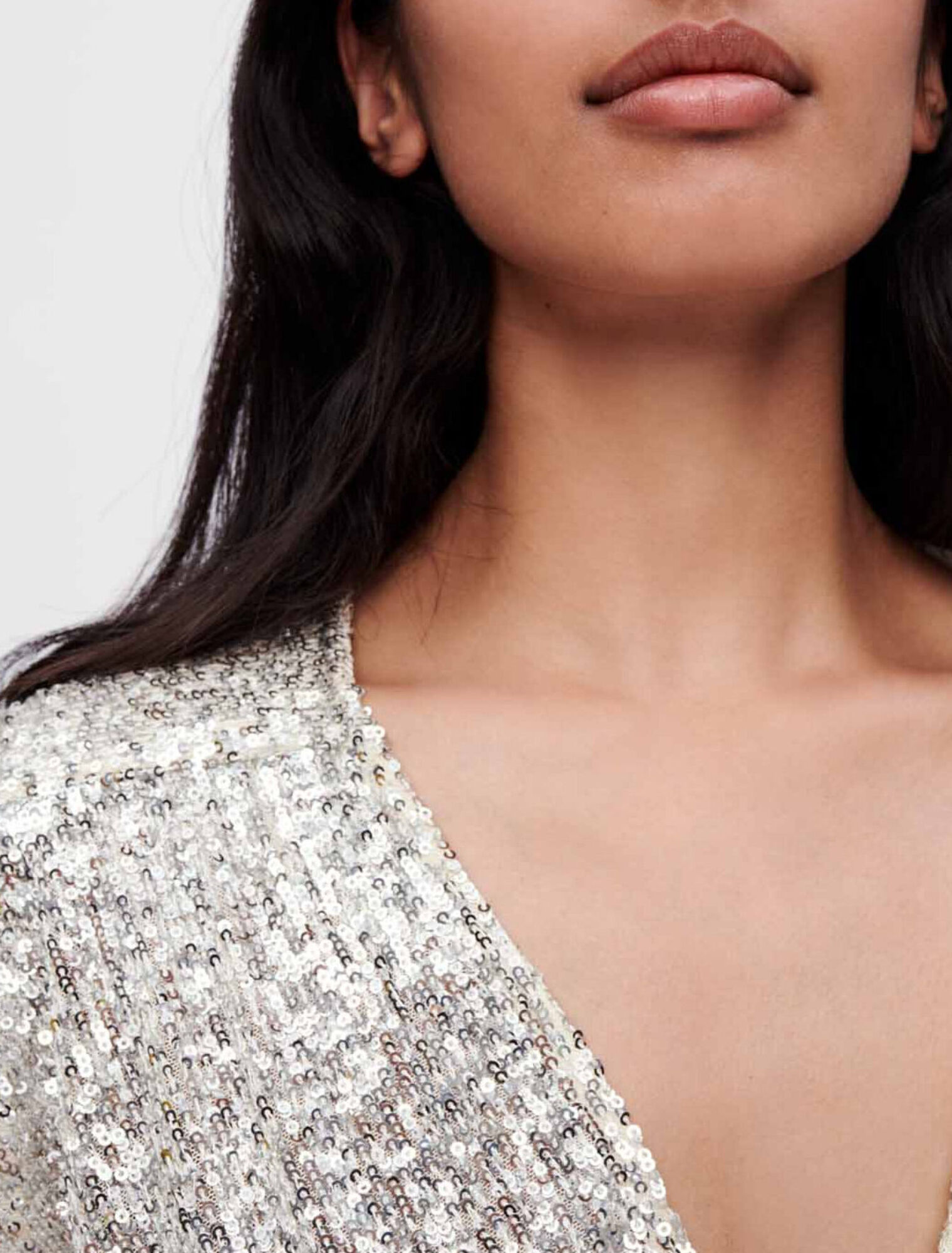 Tuta corta con paillettes