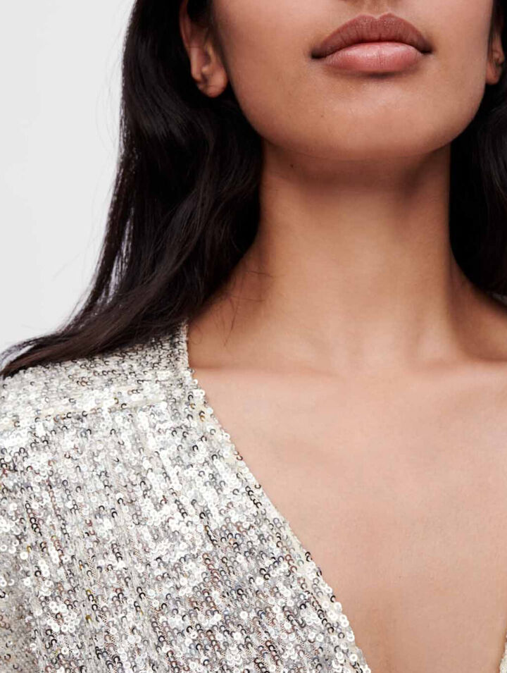 Tuta corta con paillettes