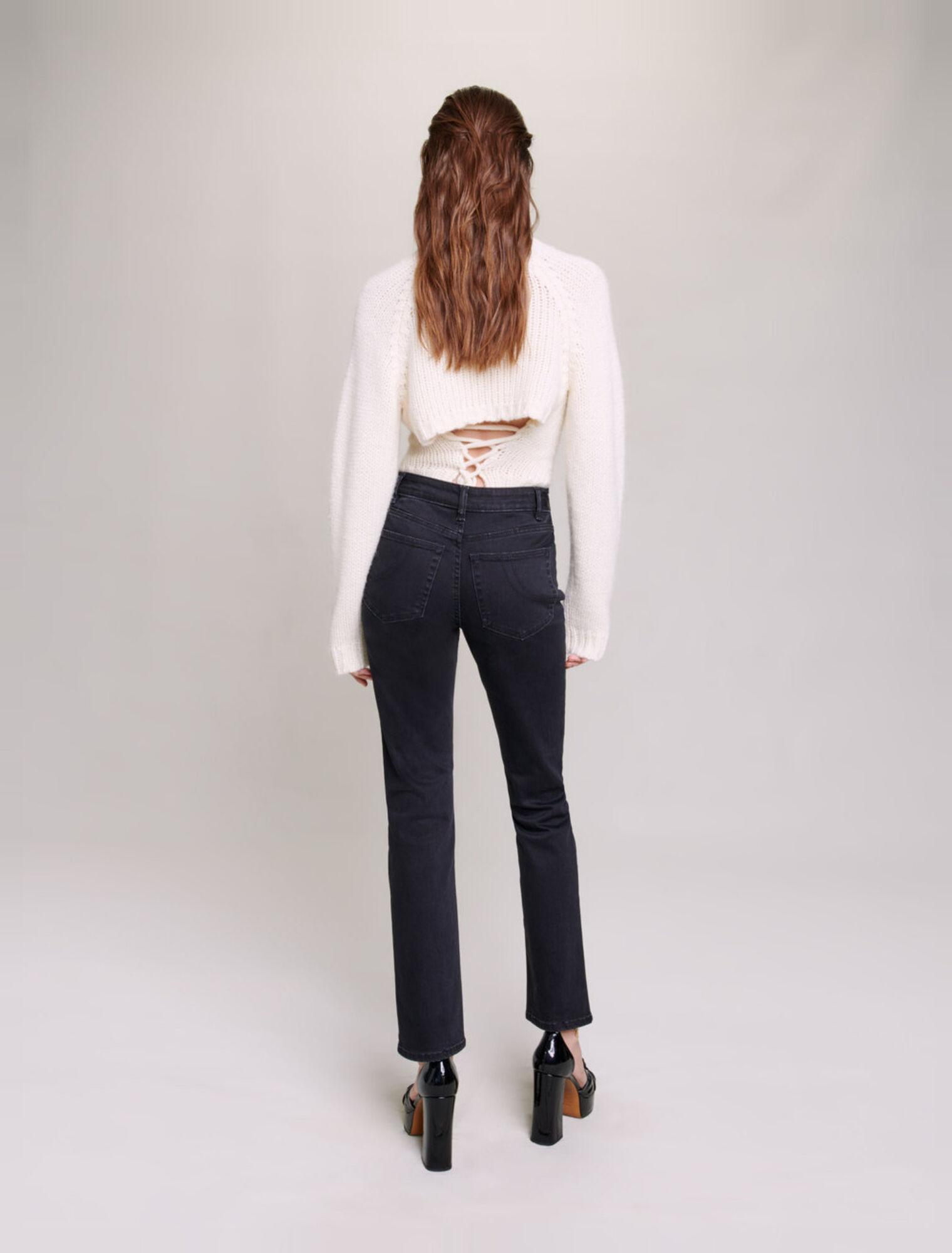 Jeans con catene e frange
