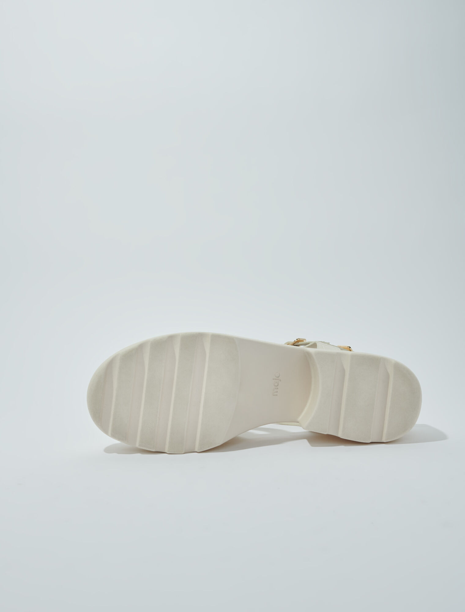 Sandali dentellati in pelle