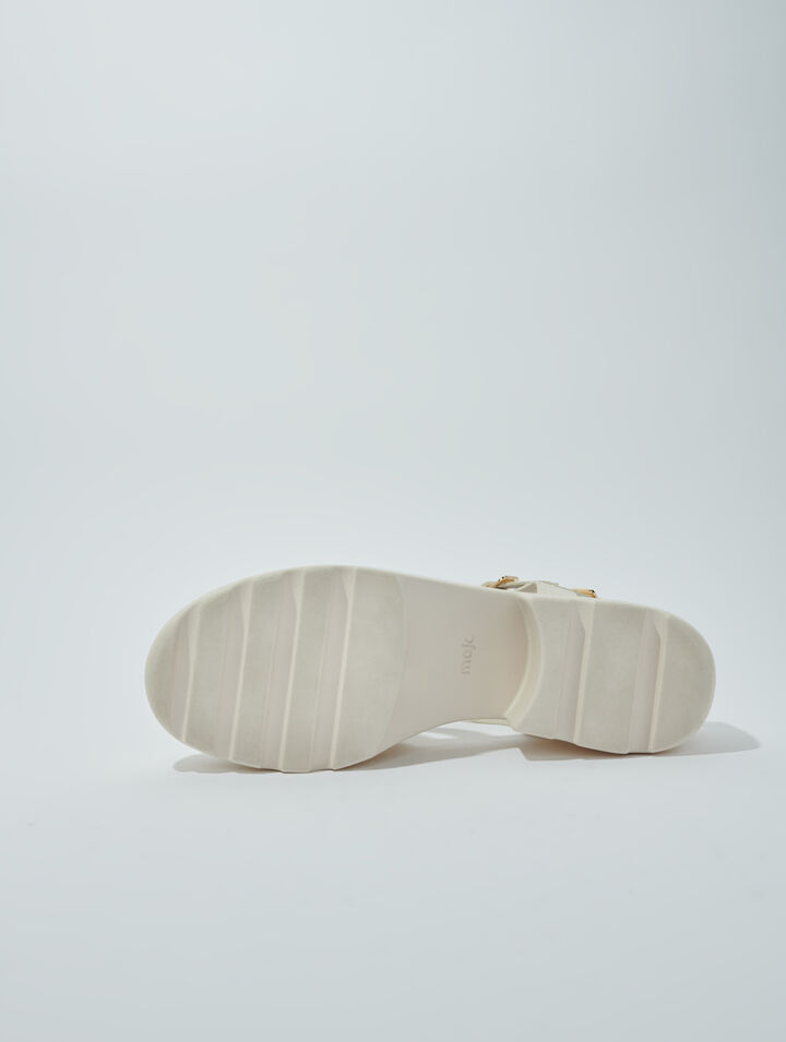 Sandali dentellati in pelle
