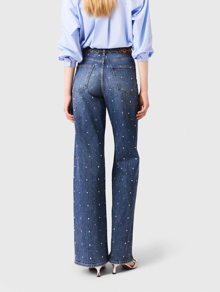 Jeans larghi in denim con borchie
