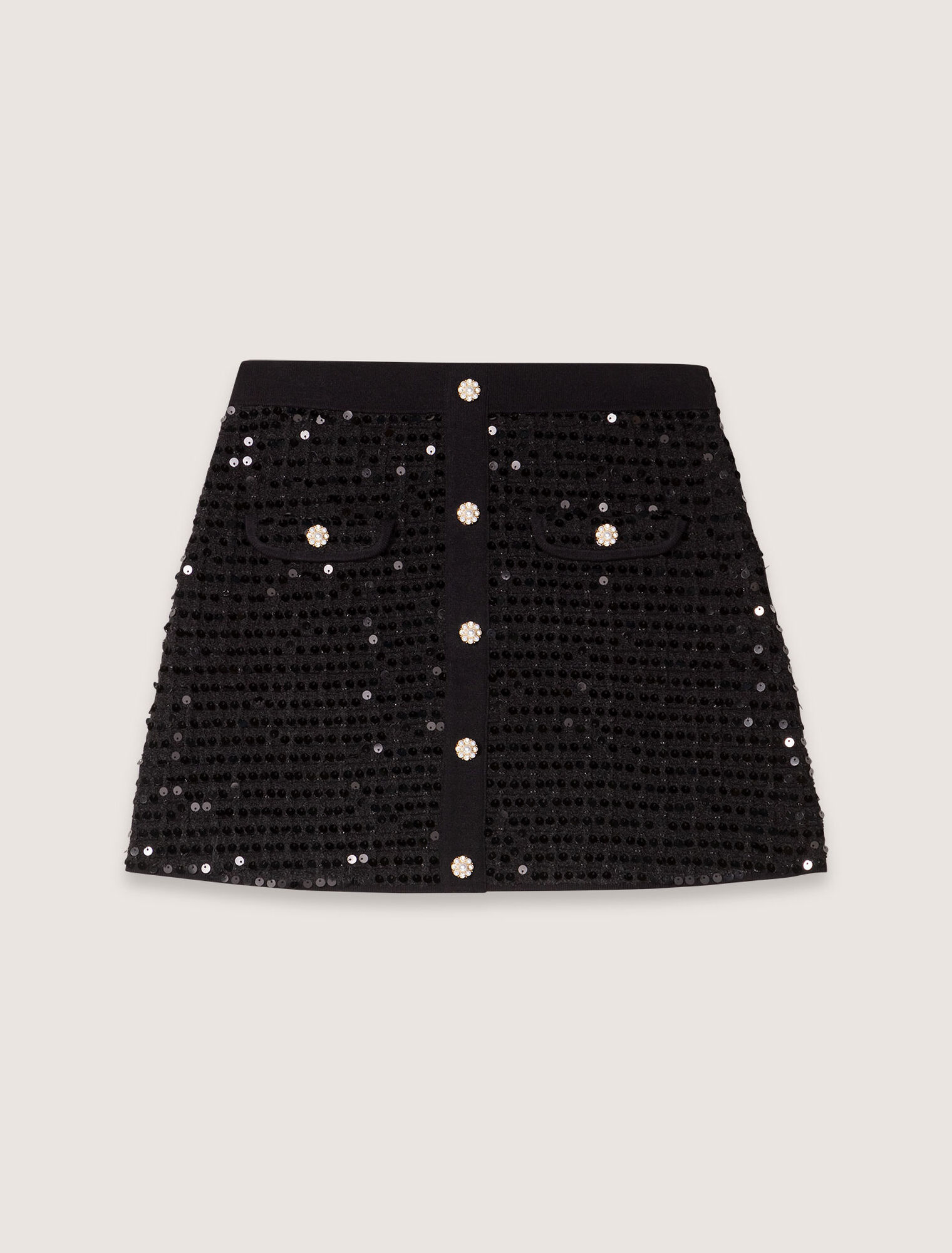 Gonna corta in maglia paillettes