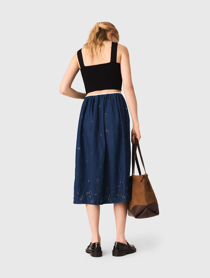 Top crop in maglia con spalline