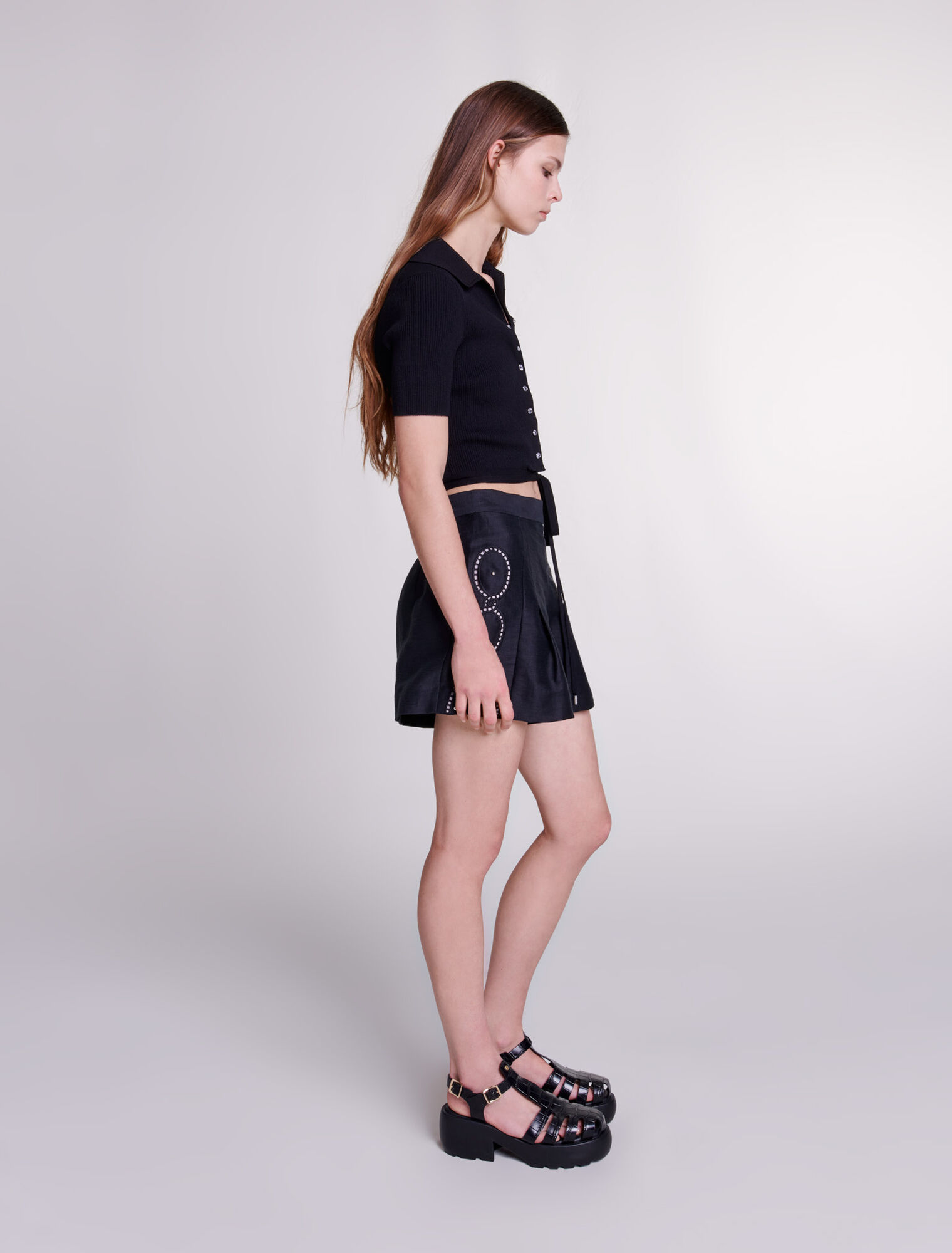 Shorts lino traforato con rivetti