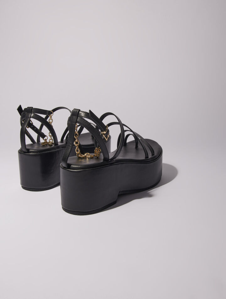 Sandali con zeppa in pelle