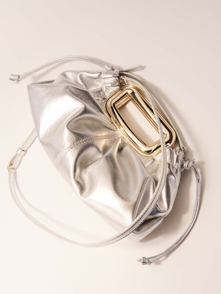 Clutch pelle metal manico metallo