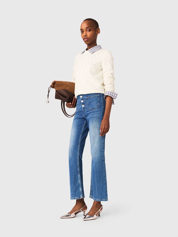 Jeans in denim con tasche