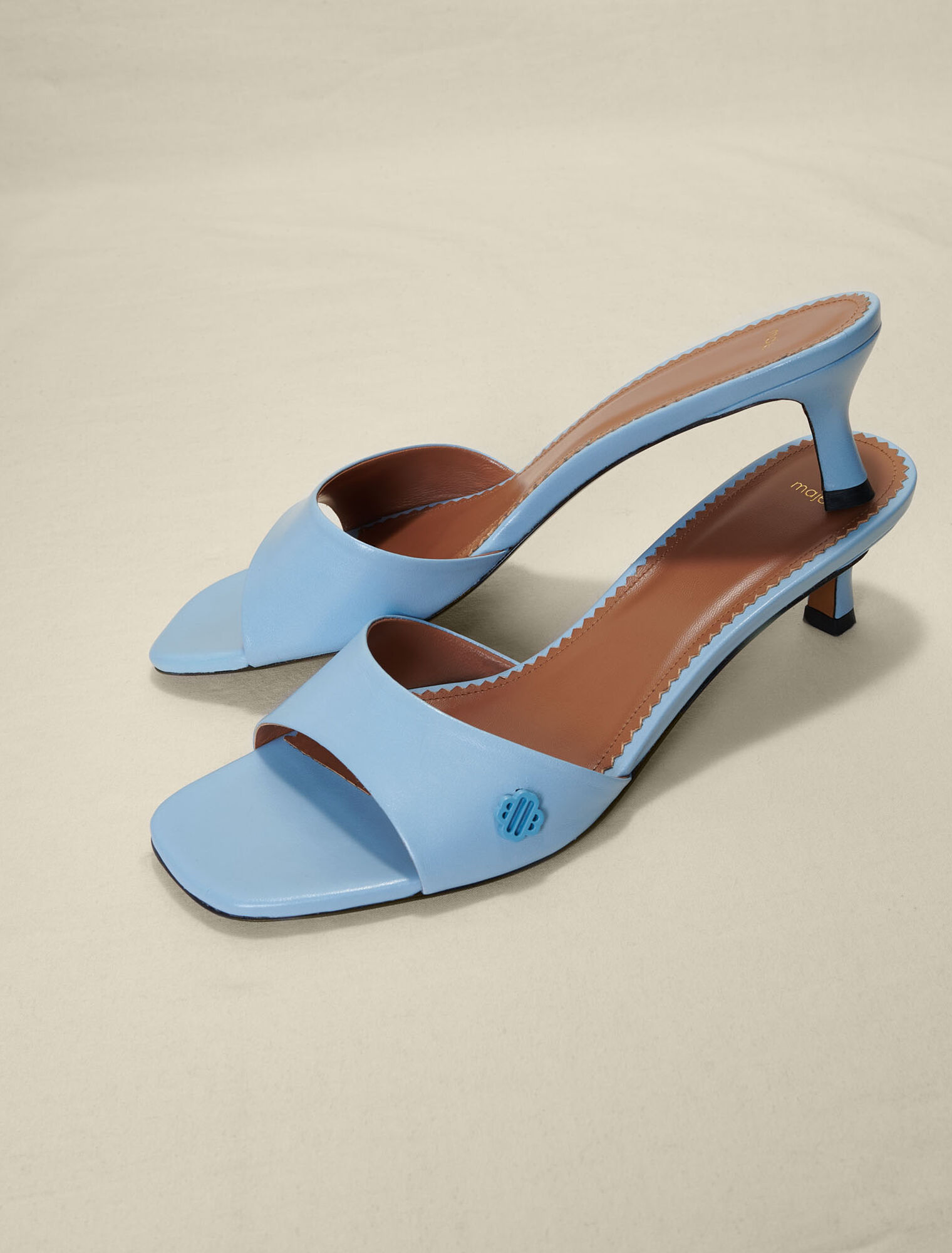 Mules in pelle