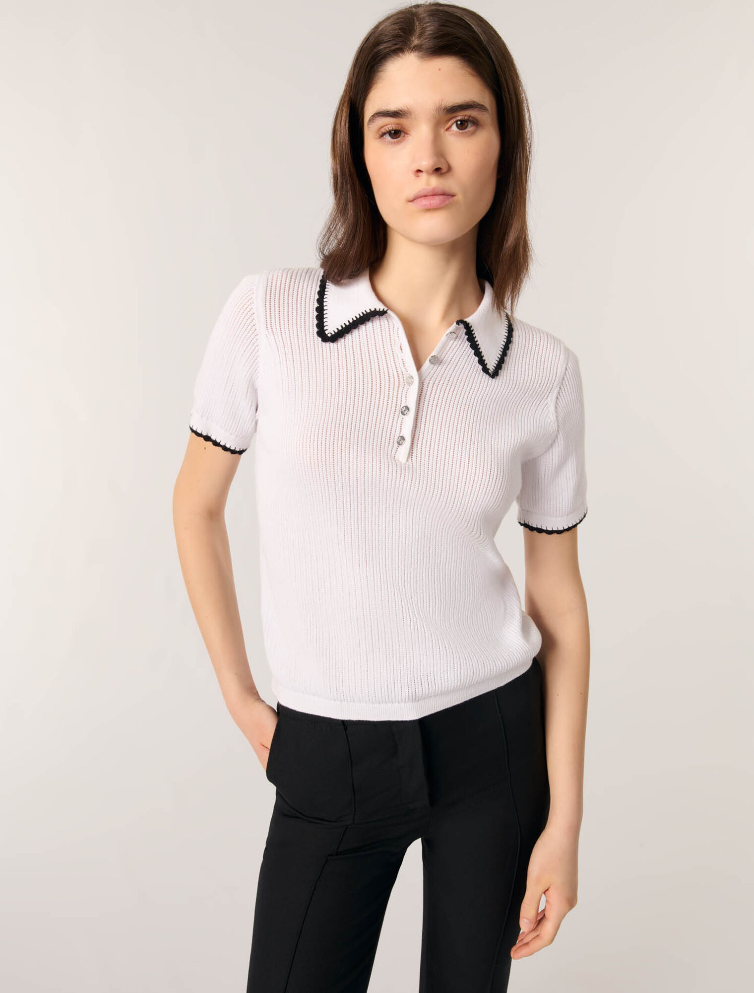 Polo in maglia pointelle e crochet