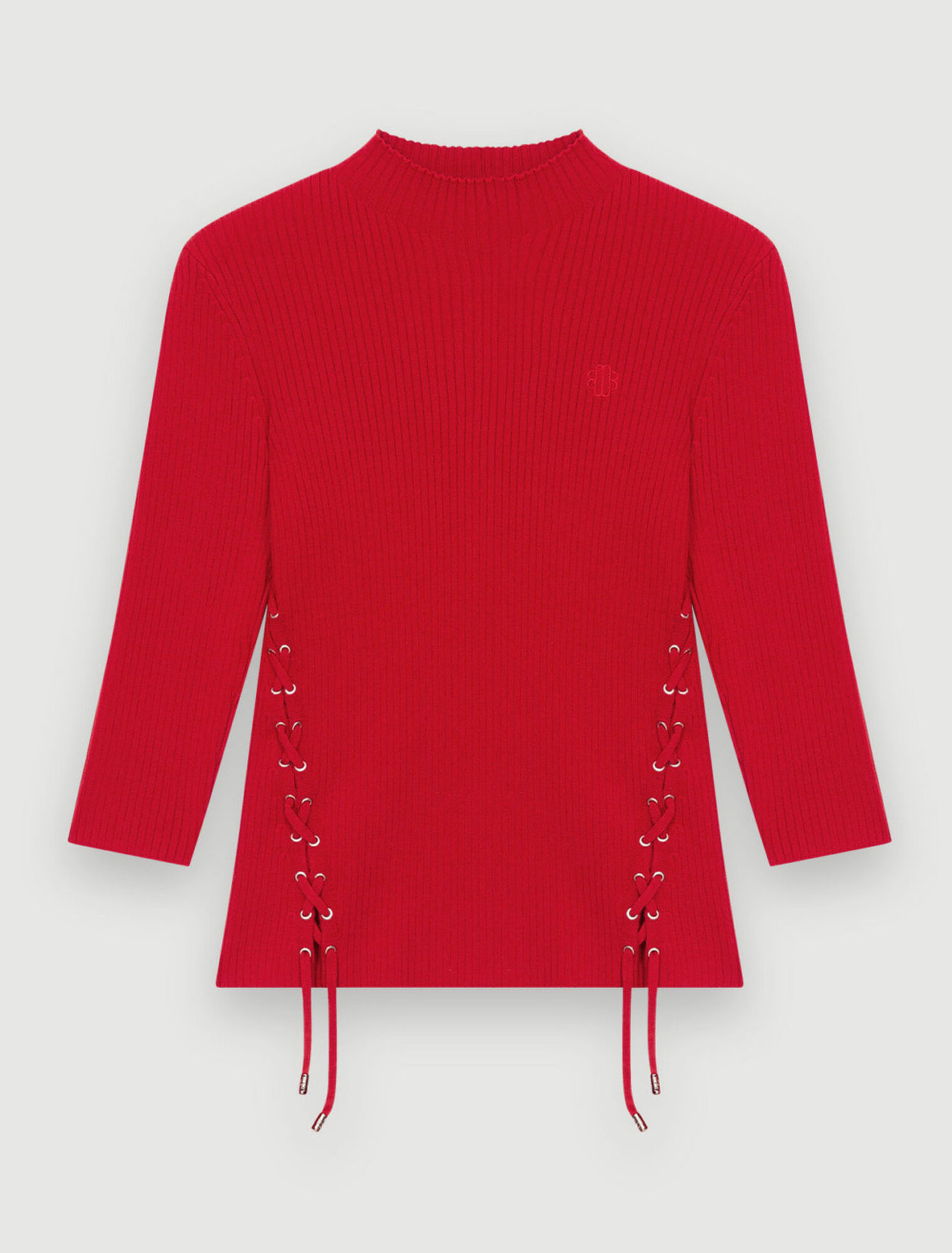 Maglia aderente con occhielli argentati