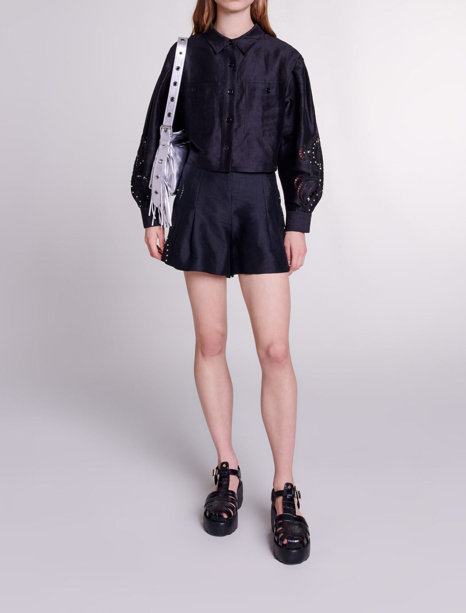 Shorts lino traforato con rivetti