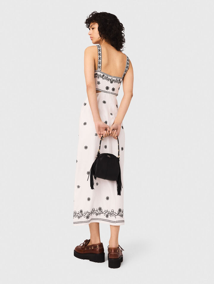 Abito lungo ricamato con cut-out