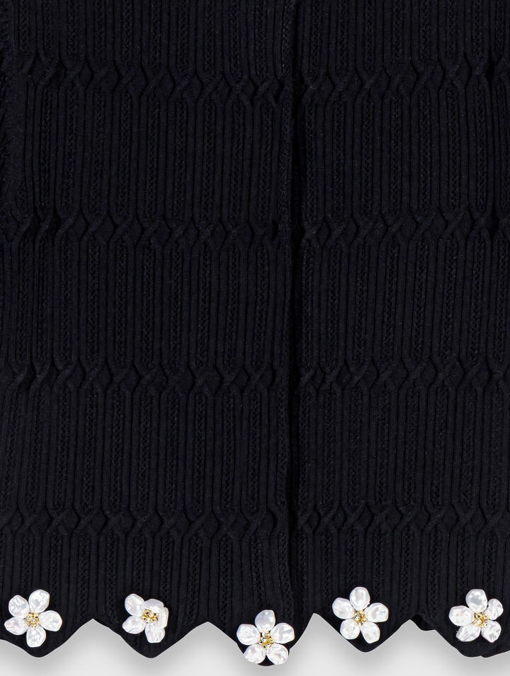 Cardigan con bijoux floreali