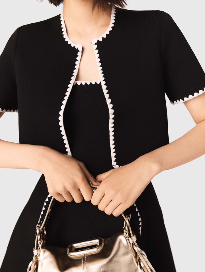 Cardigan corto con impunture