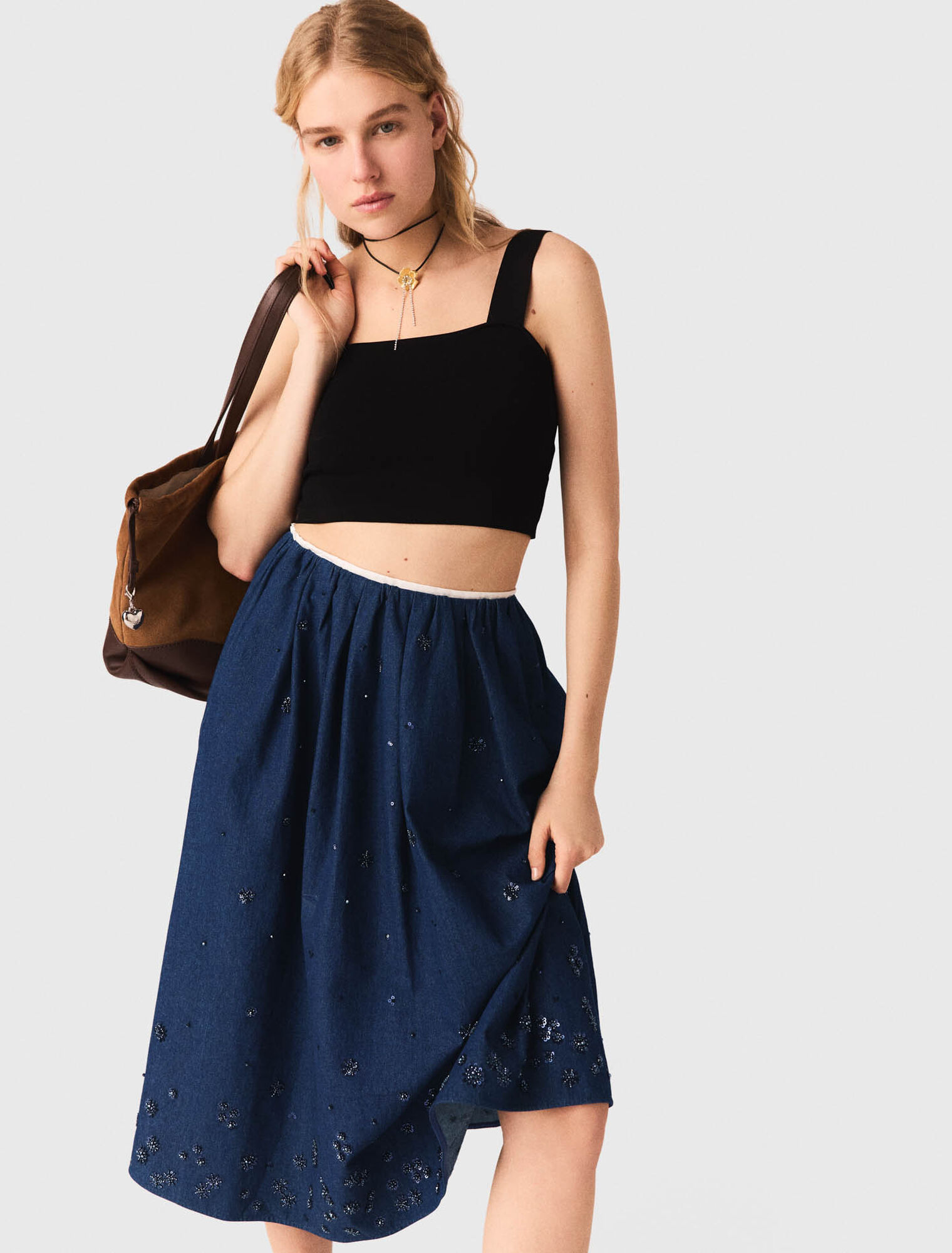 Top crop in maglia con spalline