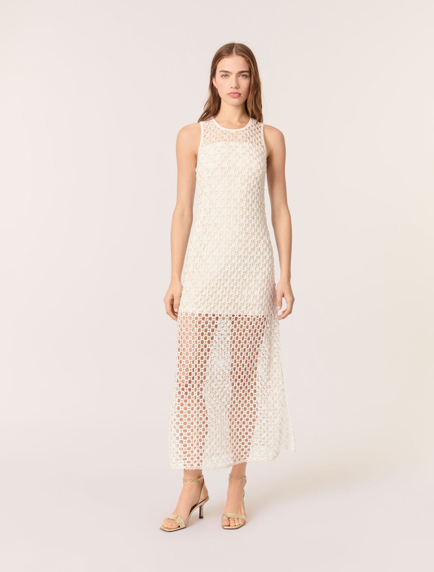 Abito lungo in crochet con perline