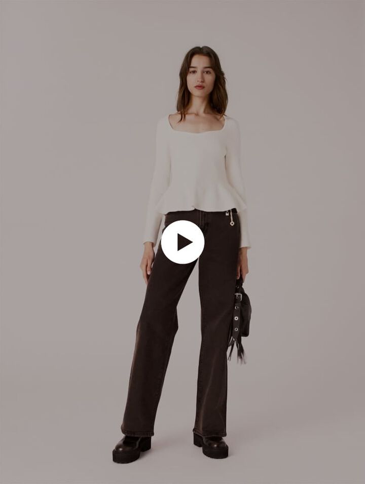 Jeans bootcut con catena