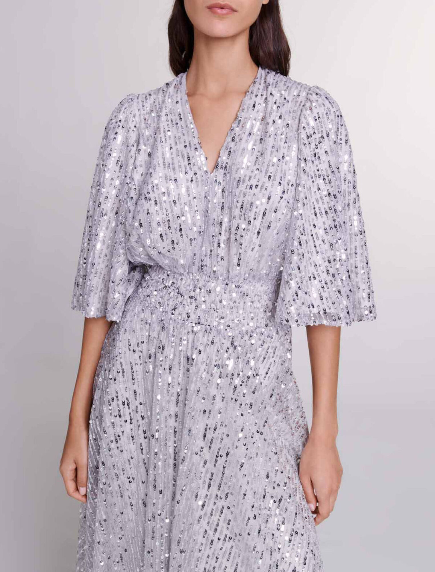 Abito lungo con lustrini