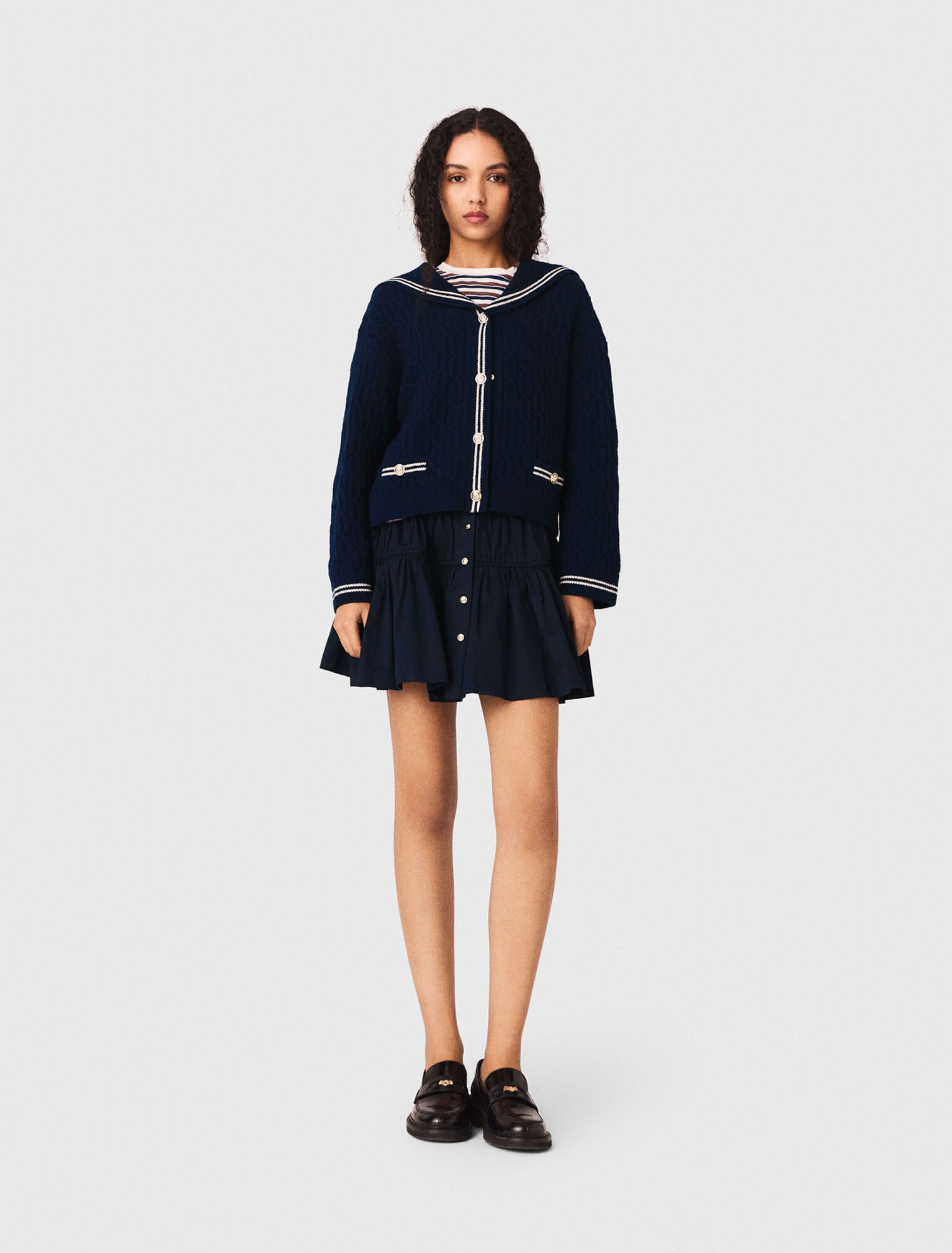 Cardigan a trecce con scollo barca