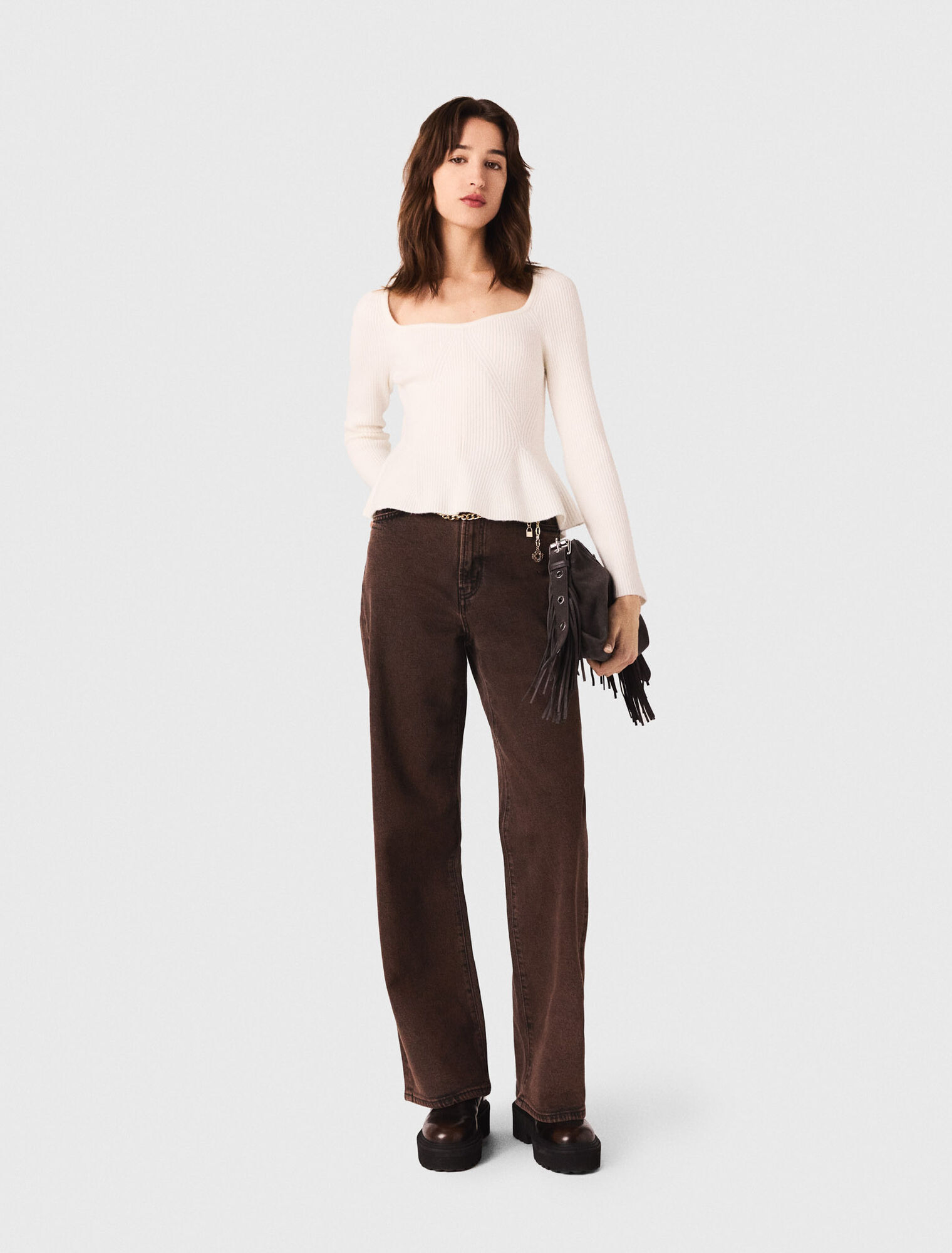 Jeans bootcut con catena