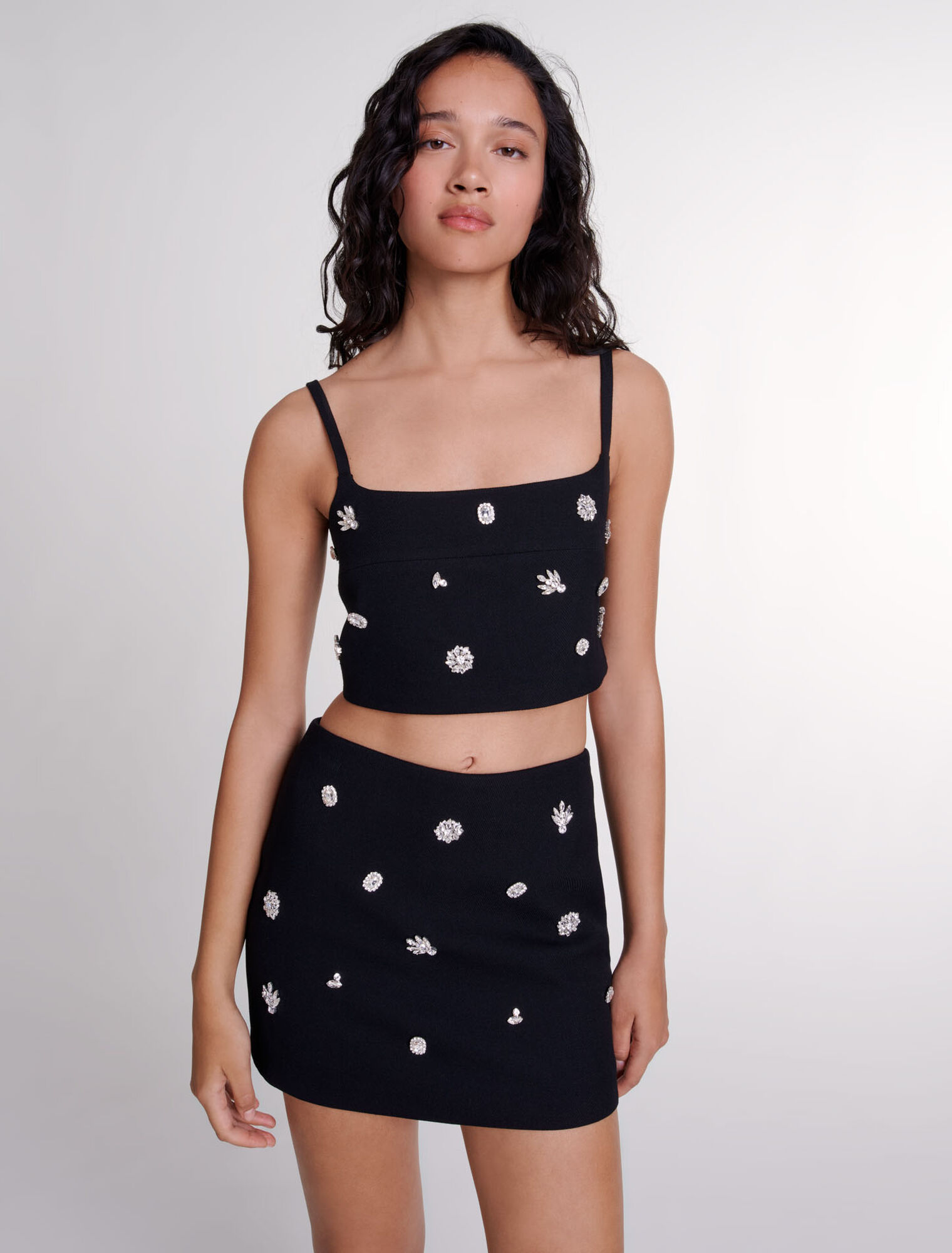Pantaloncini trompe l'oeil con strass