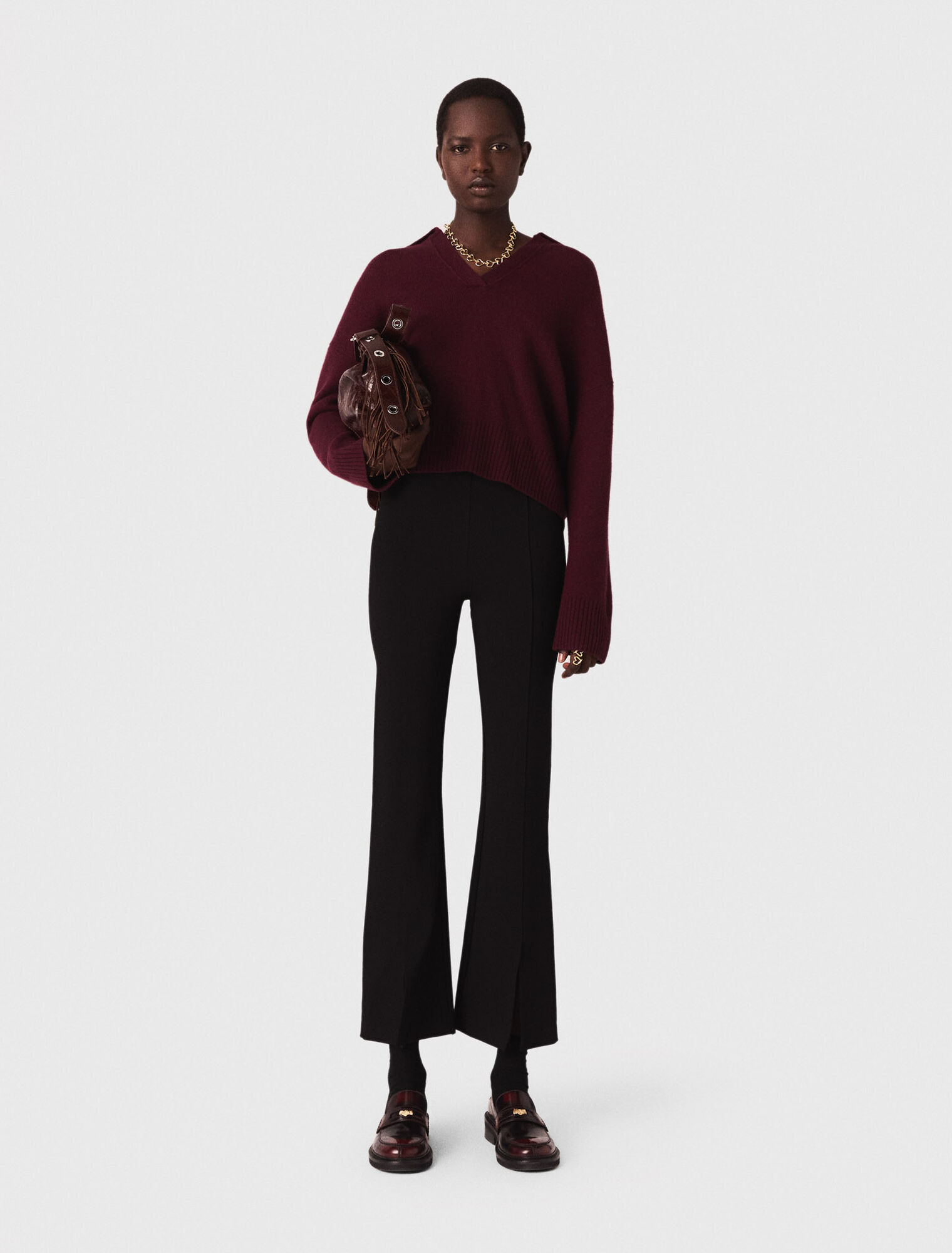 Pantaloni con spacco