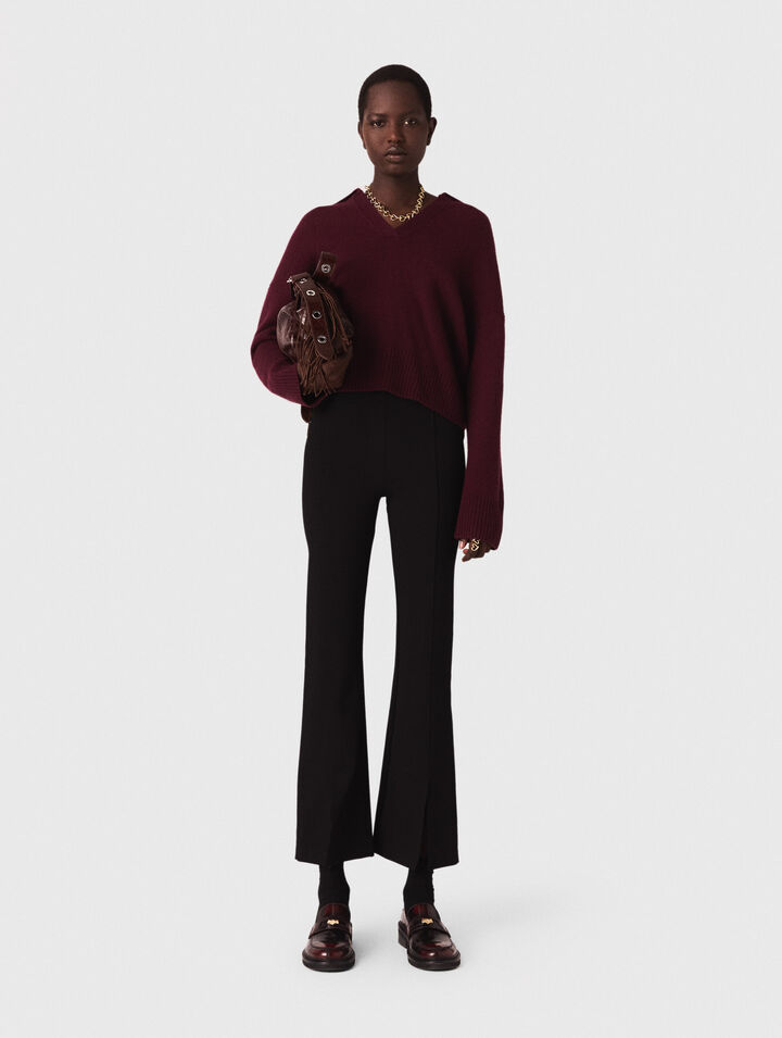 Pantaloni con spacco