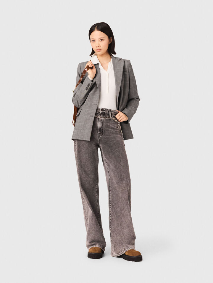 Jeans larghi e cintura a maglie