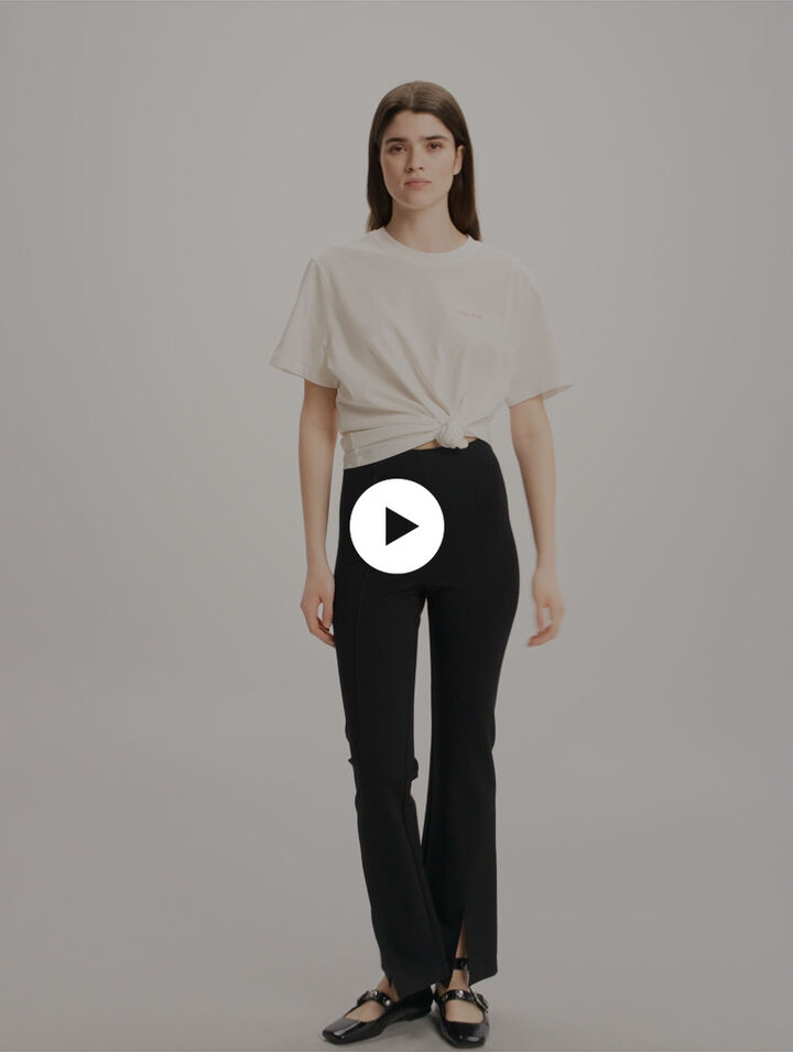 Pantaloni con spacco