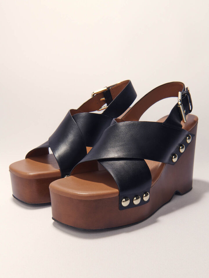 Sandali con zeppa in pelle