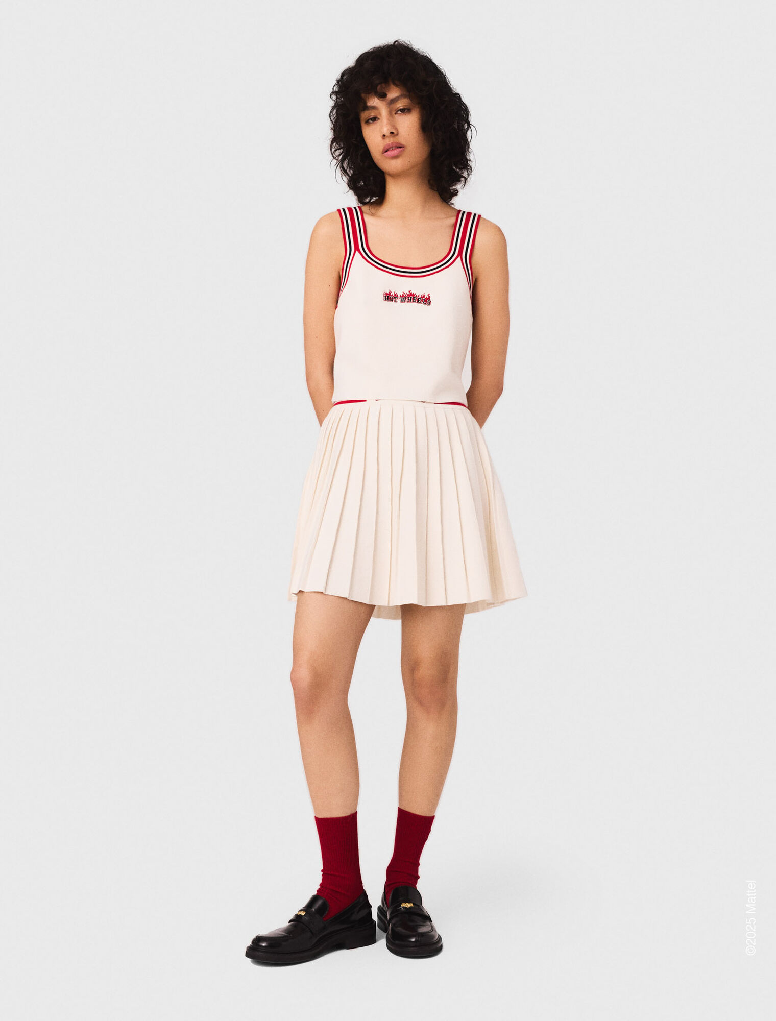 Gonna corta plissettata in maglia