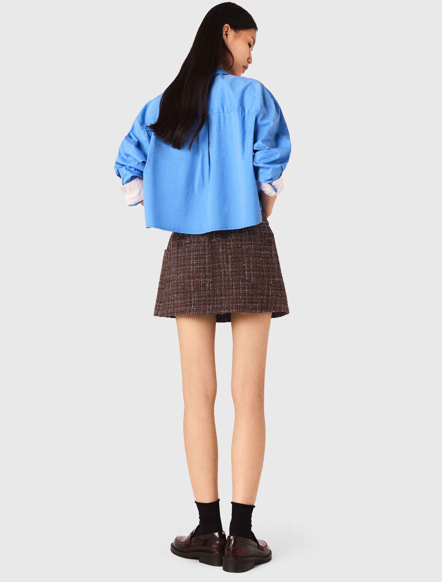 Shorts in tweed con fascia elastica