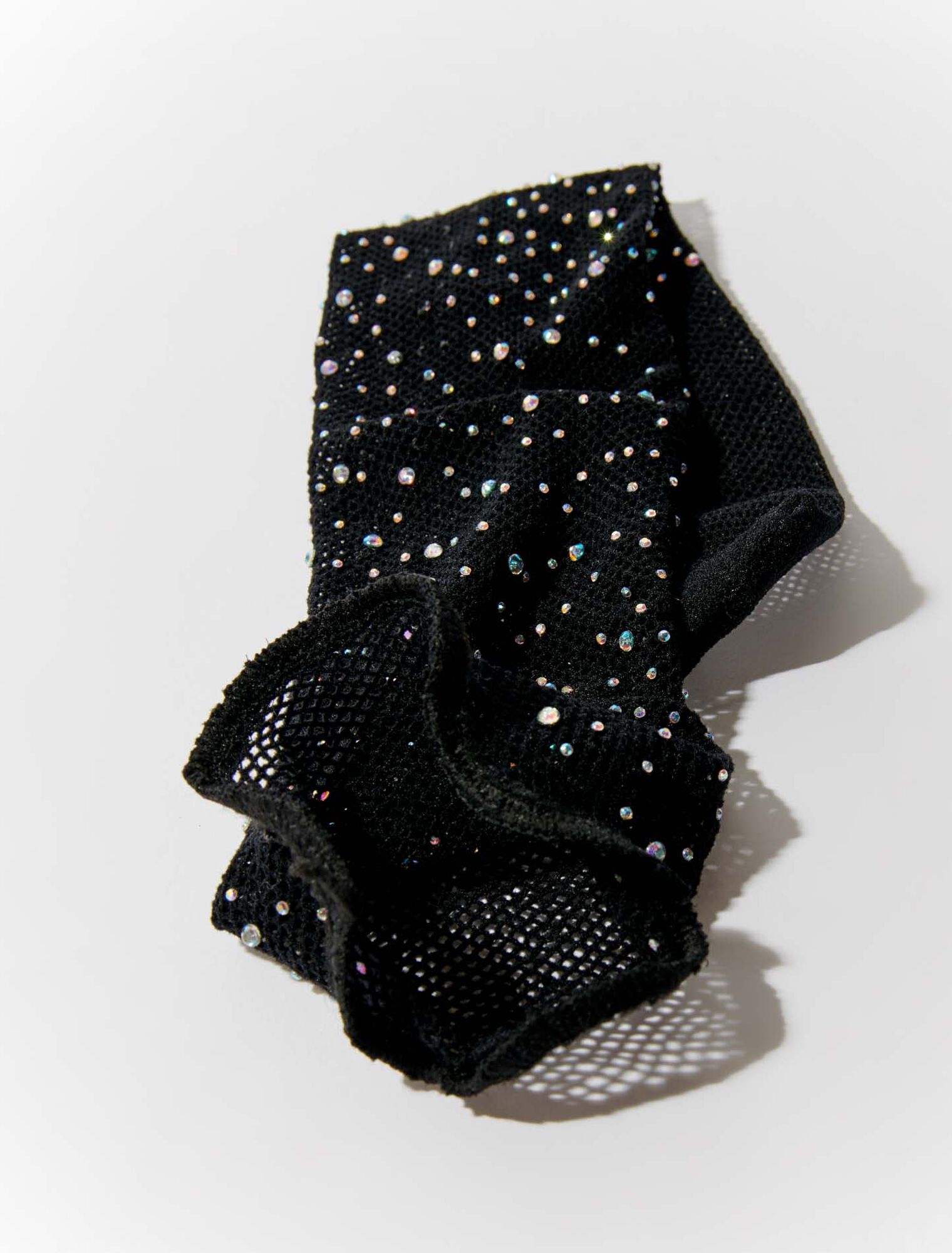 Calze a rete glitterate