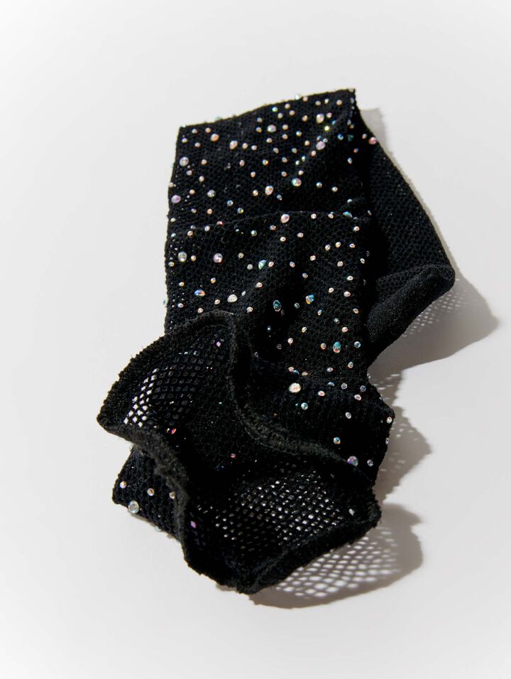 Calze a rete glitterate