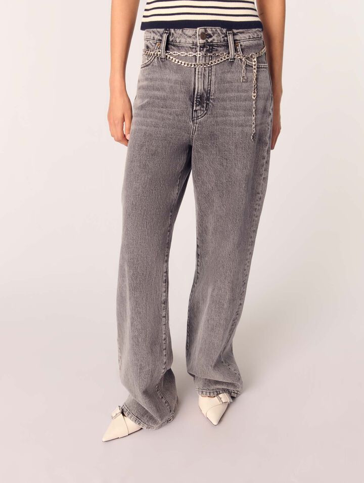 Jeans larghi e cintura a maglie