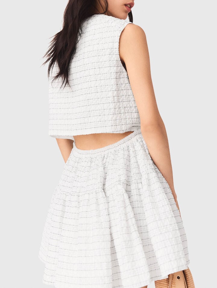 Abito corto svasato schiena aperta